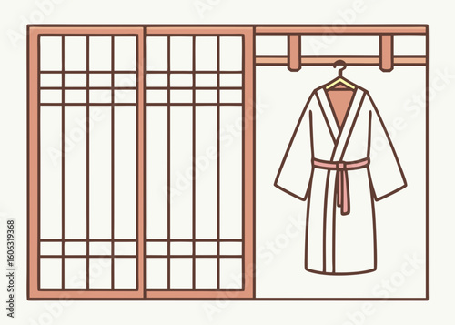 Bathrobe hanging on a rack near a sliding door