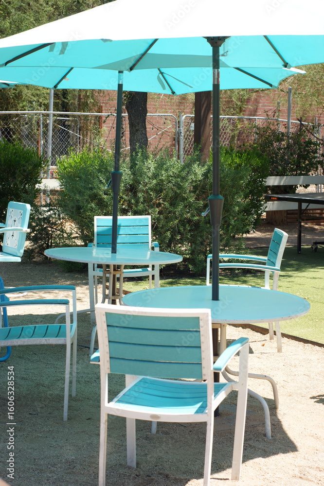 Fototapeta premium Outdoor patio with tables and chairs