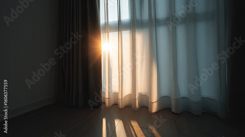 Sunlight shining through sheer curtains creating warm shadows floor
