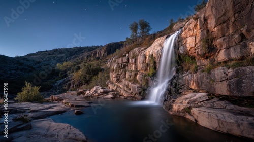 Cascading waterfall adventure serene valley nature photography nighttime tranquil setting