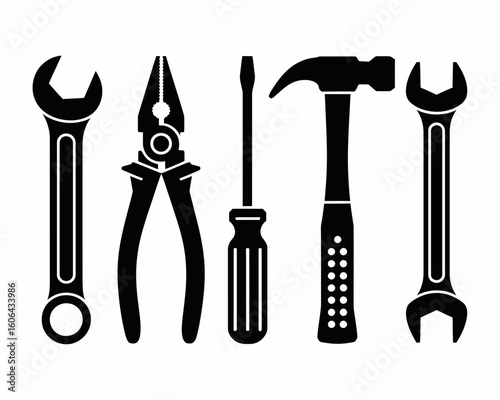 Collection of common hand tools including wrenches pliers and a hammer silhouette isolated on white background