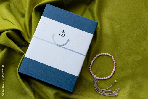 弔事のお返し「志」と数珠