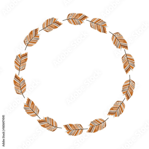 A circular arrangement features various orange and brown leaves with striped patterns. Perfect for autumn decor or crafting ideas, giving a warm seasonal touch.
