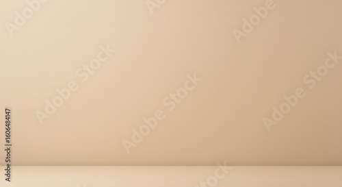 Minimalist Beige Studio Room with a Curved Cyclorama Wall and Soft, Gentle Lighting