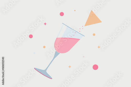 A glass of pink wine is being poured, surrounded by festive decorations