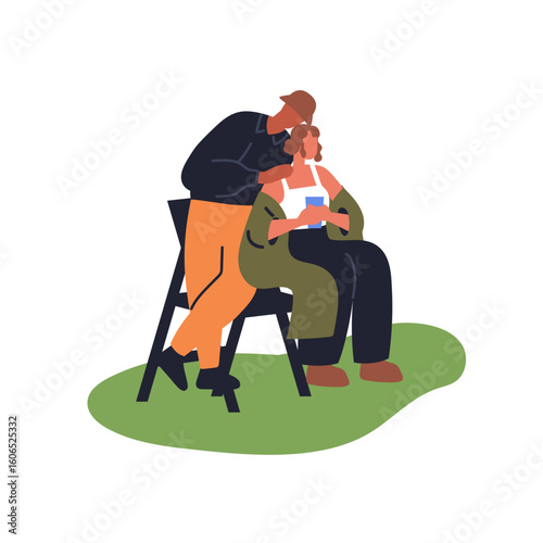 Love couple sitting outdoors together. Young man and woman enjoying summer ho...