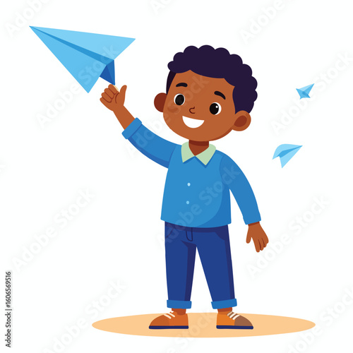 A cheerful young boy holding a blue paper airplane, ready to fly it.