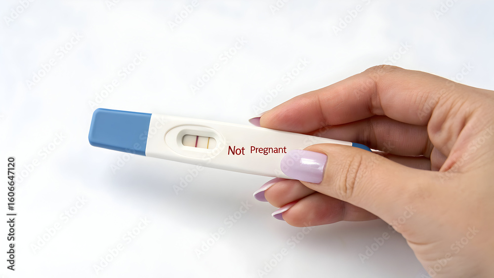 Obraz premium Hand holding a medical thermometer for checking temperature