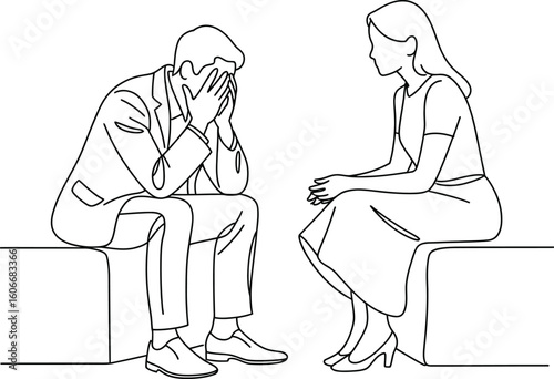 Man in distress being comforted by a woman during a conversation