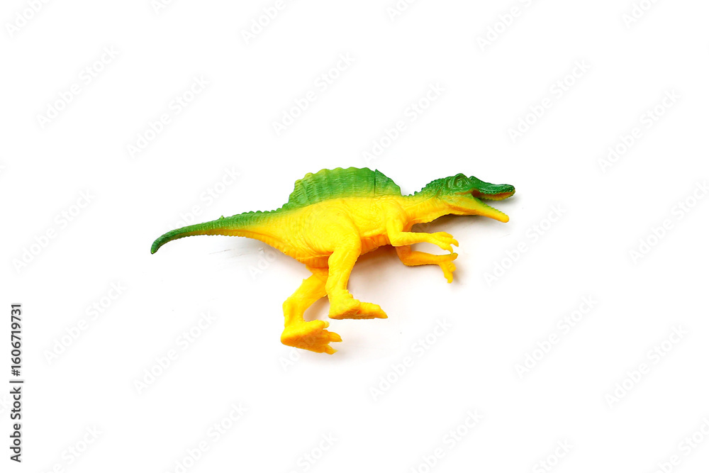 Fototapeta premium Plastic dinosaur toy on white background