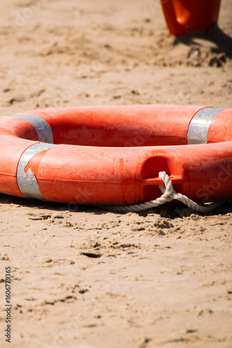 Lifering lifeguard on the beach sunny day