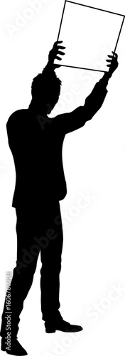 Protestor or demonstrator at a demonstration march, picket line or strike protest rally in silhouette. Holding up a banner or picket sign board placard.