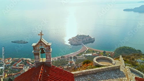 Church above budva with views of Sveti stefan island and adriatic sea