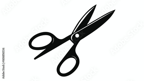 A set of metal scissors with sharp blades isolated on a white background