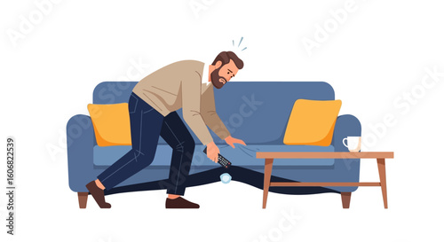 man searching for remote under sofa