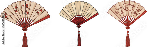 Traditional decorative fans in red and cream colors with patterns  