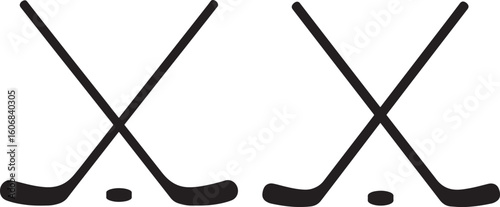 Two crossed hockey sticks with pucks silhouette