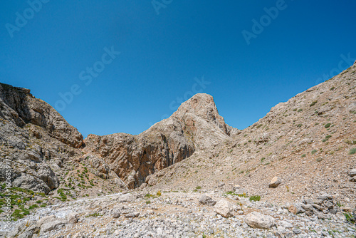The scenic views of Demirkazık summit, Davlumbaz summit and dipsiz göl at the Aladağlar National park in Niğde, Turkey