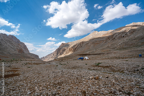 The scenic views of Demirkazık summit, Davlumbaz summit and dipsiz göl at the Aladağlar National park in Niğde, Turkey