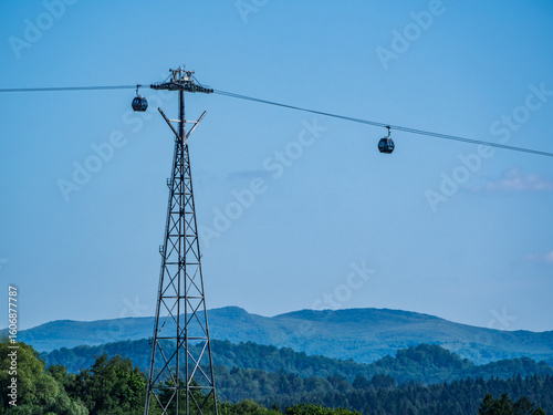 Cable Car Over Solina Lake Dam at Dusk with Full Moon in the Background, Bieszczady Mountains, Poland