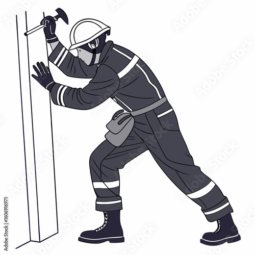 Person in dark uniform and helmet hammering a vertical surface with a hammer worker construction