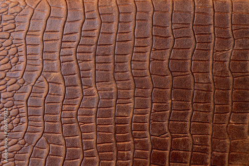 crocodile, alligator brown skin background genuine leather texture background.