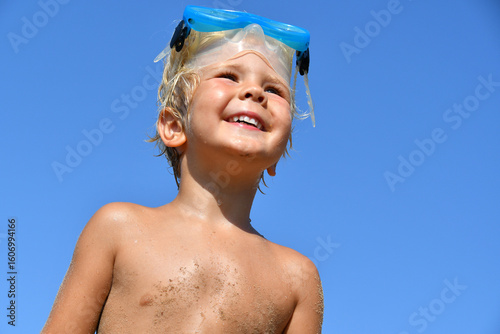 Little Boy in Snorkel Mask Smiling at the Beach
