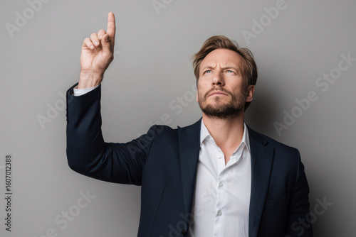 single person stands confidently in welllit room demonstrating gesture of admonishment