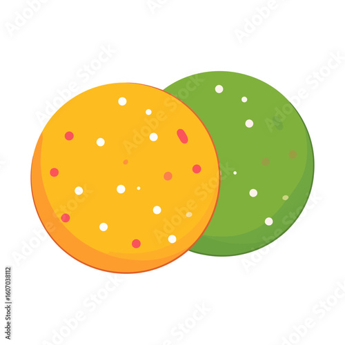 Colorful yellow and green Indian mathri or khakhra savory crackers with spice dots.