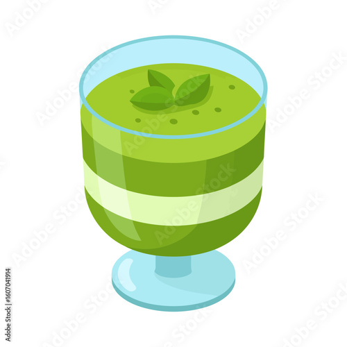Layered green mousse dessert in a footed glass, garnished with fresh mint leaves.