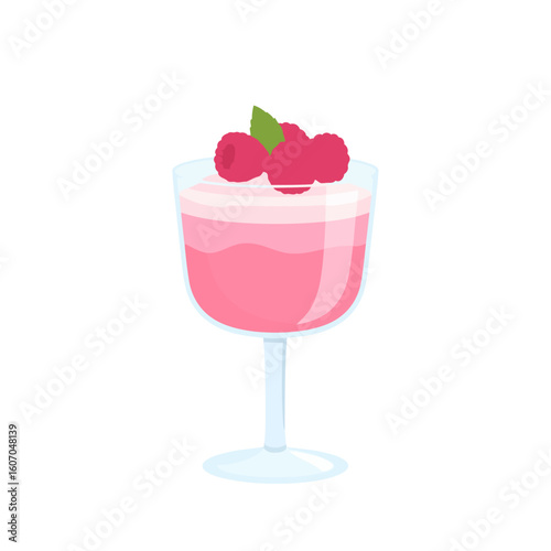 Pink raspberry mousse dessert in a stemmed glass with fresh berries and mint garnish.