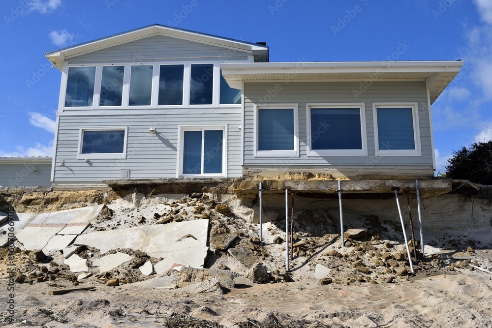 Ocean beach house damaged by a hurricane. Ocean beach house damaged by a hurricane.