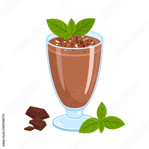 Rich chocolate mousse in a footed glass, garnished with fresh mint leaves and grated chocolate pieces.