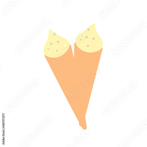 Heart-shaped double wafer cone with yellow ice cream and pastel sprinkles.