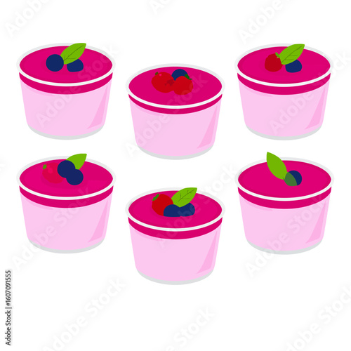 Set of six pink berry mousse desserts in cups, garnished with fresh blueberries, raspberries, and mint leaves.