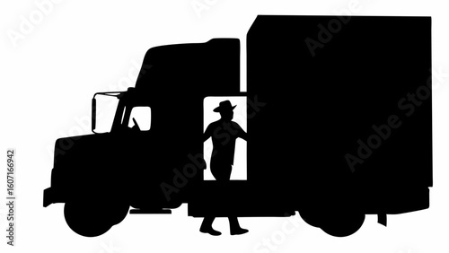 Silhouette of a truck with a man in a hat standing in the doorway of the trailer in black and white