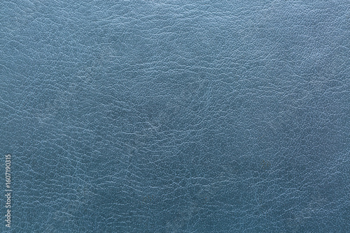 Gray macro synthetic leather texture,Natural, genuine gray leather texture close up, macro. Structure of glossy leatherette, artifical skin surface with embossing pattern. Background, wallpaper.