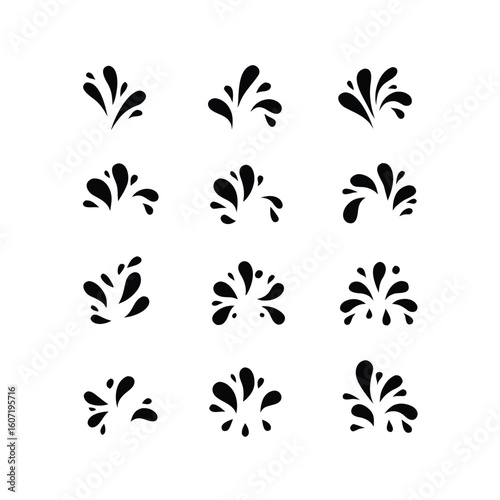 Twelve Black Water Splashes Isolated on White Background liquid drop
