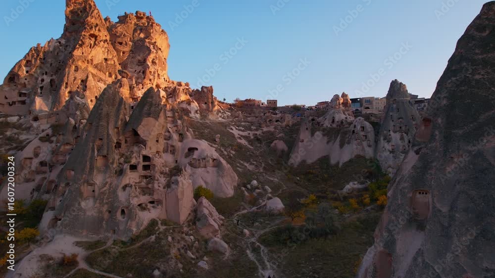 Aerial evening view Ancient Uchisar castle, underground city of Cappadocia Turkey, Goreme national park. Aerial evening view Ancient Uchisar castle, underground city of Cappadocia Turkey, Goreme national park.