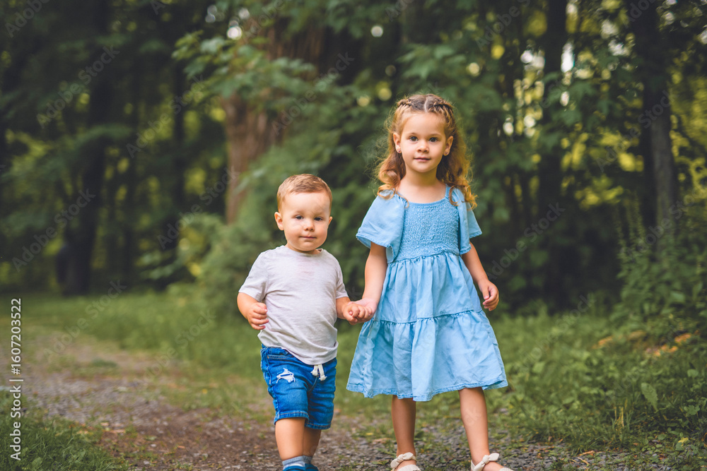 Fototapeta premium Brother and sister on summer season forest