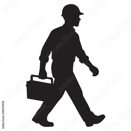 Silhouette of a Construction Worker Walking with a Toolbox Wearing a Hard Hat in a Side View Portrayal