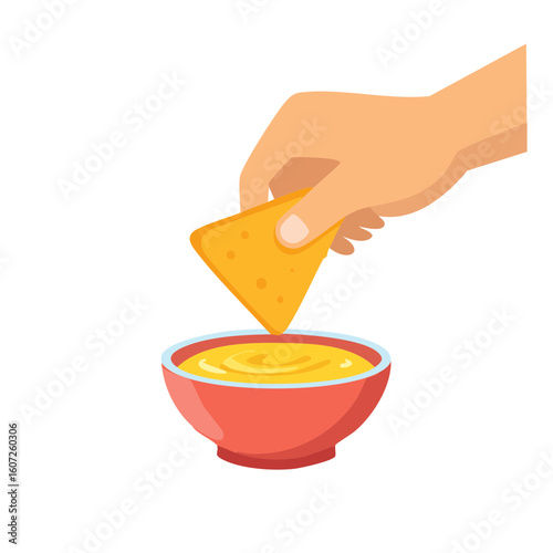 Hand dipping a tortilla chip into a bowl of sauce
