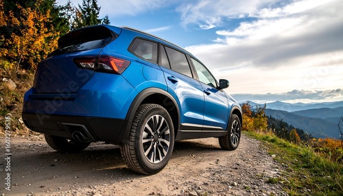 Blue SUV on a mountain path
