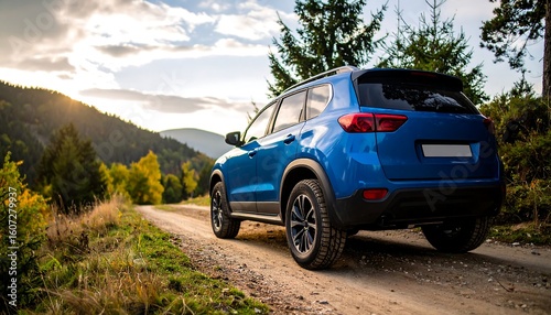 Blue SUV on a scenic dirt road