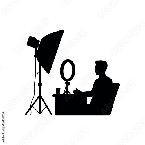 Silhouette of person sitting at desk with ring light and studio light vector