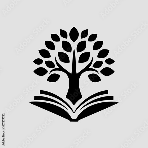 A silhouette of a tree growing from an open book represents the power of knowledge and education