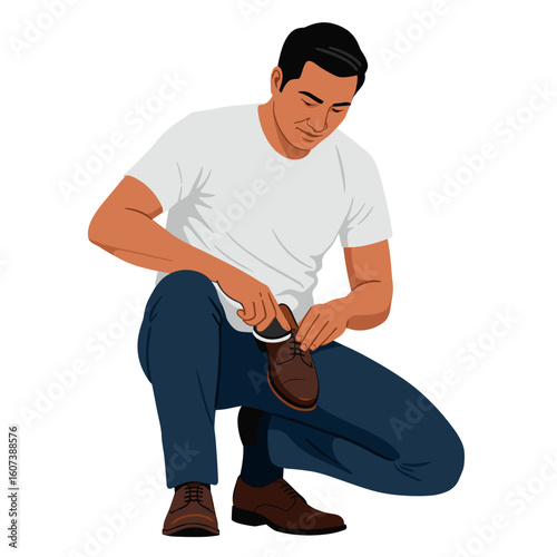 A man attentively polishing a shoe.