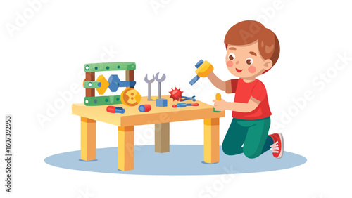 Young boy happily building with colorful toy tools and construction set