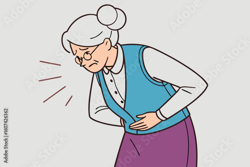 Elderly woman with stomach pain holding abdomen stomach ache discomfort