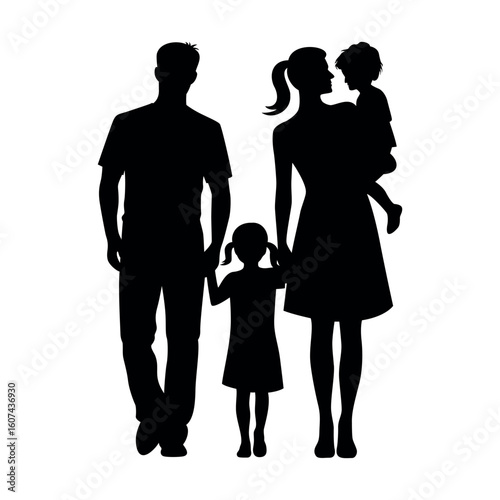 Family silhouette with parents and two children in loving pose